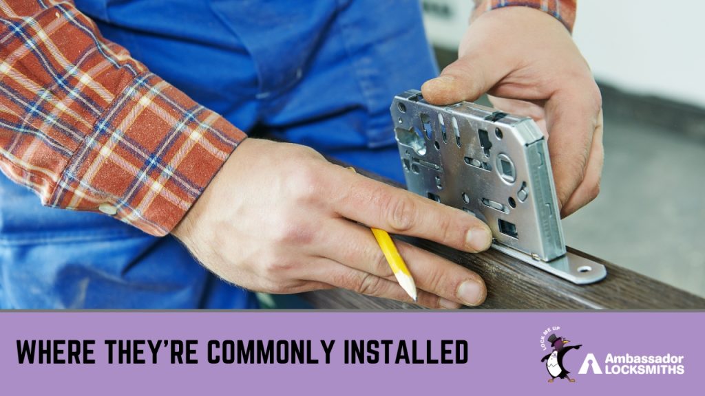 Locksmith measuring door frame for digital lock fitting.