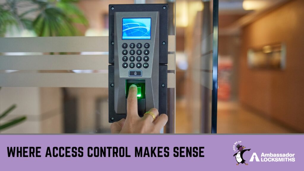 What Is an Access Control System and How It Works » access control system A close-up of a person's hand with a gold ring pressing their index finger onto a green-glowing biometric scanner on a wall-mounted access keypad device.